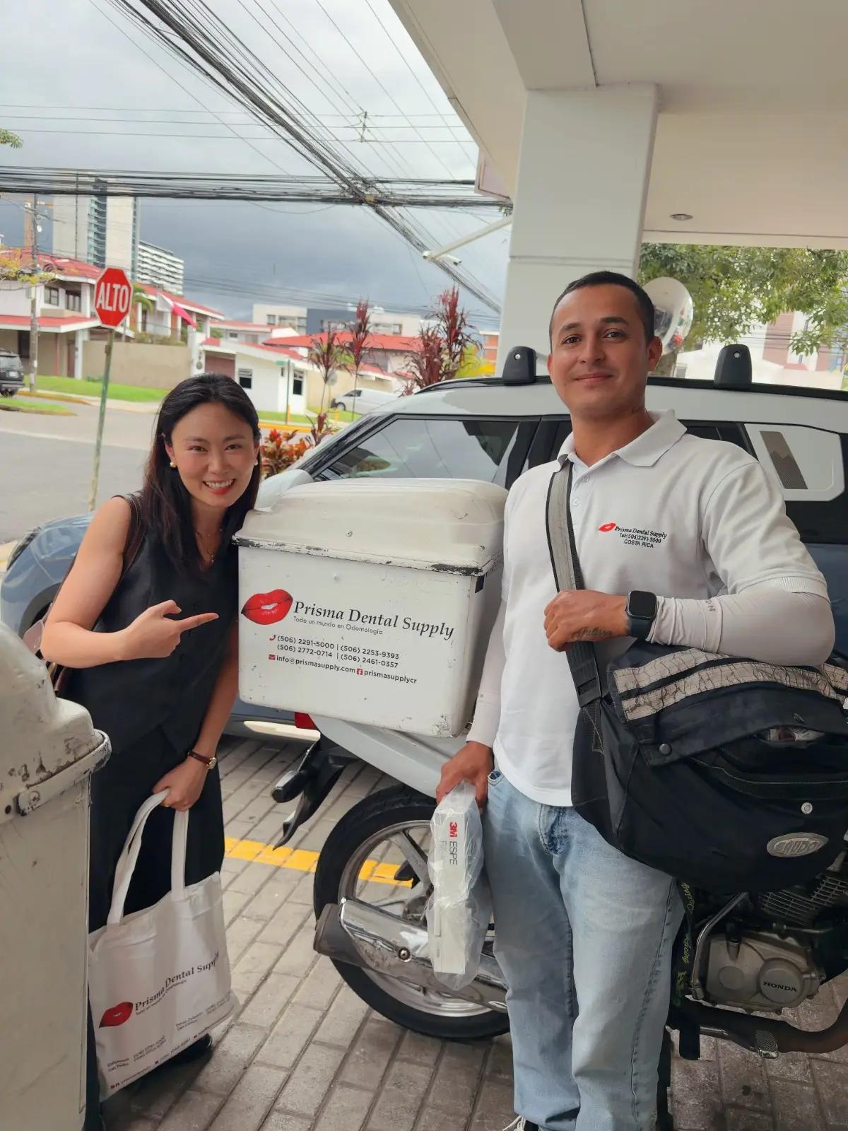 INTOP representative presenting a certificate during a client visit